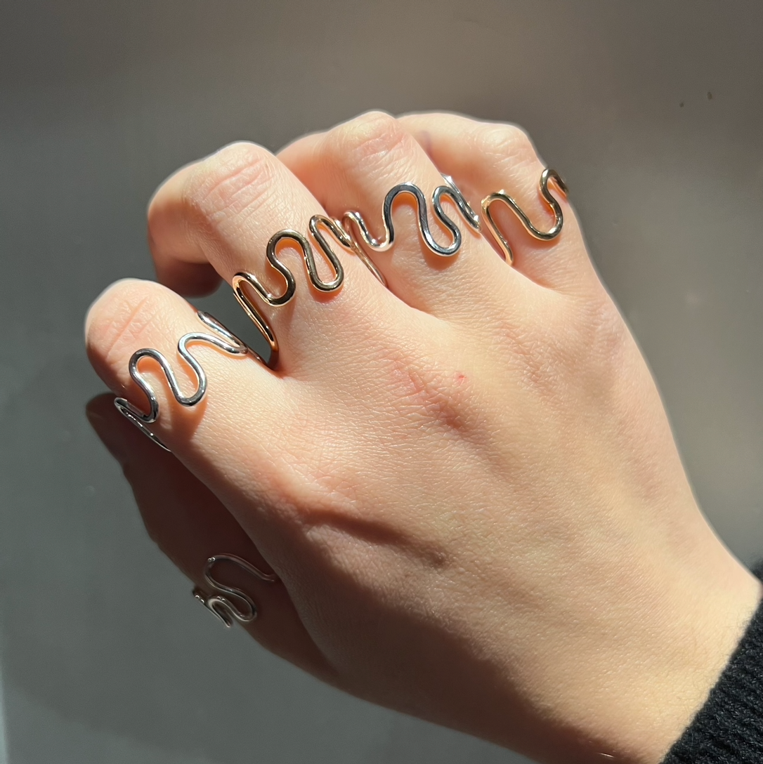 Five ripple rings, two gold vermeil and three sterling silver.