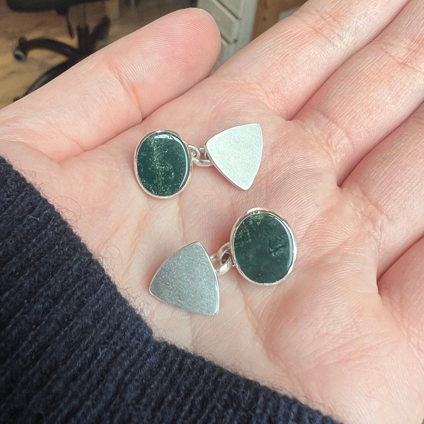 Bespoke bloodstone cufflinks set in sterling silver.